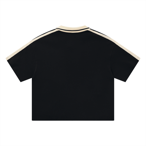 Courtside Polo — Black with cream trim, back view.